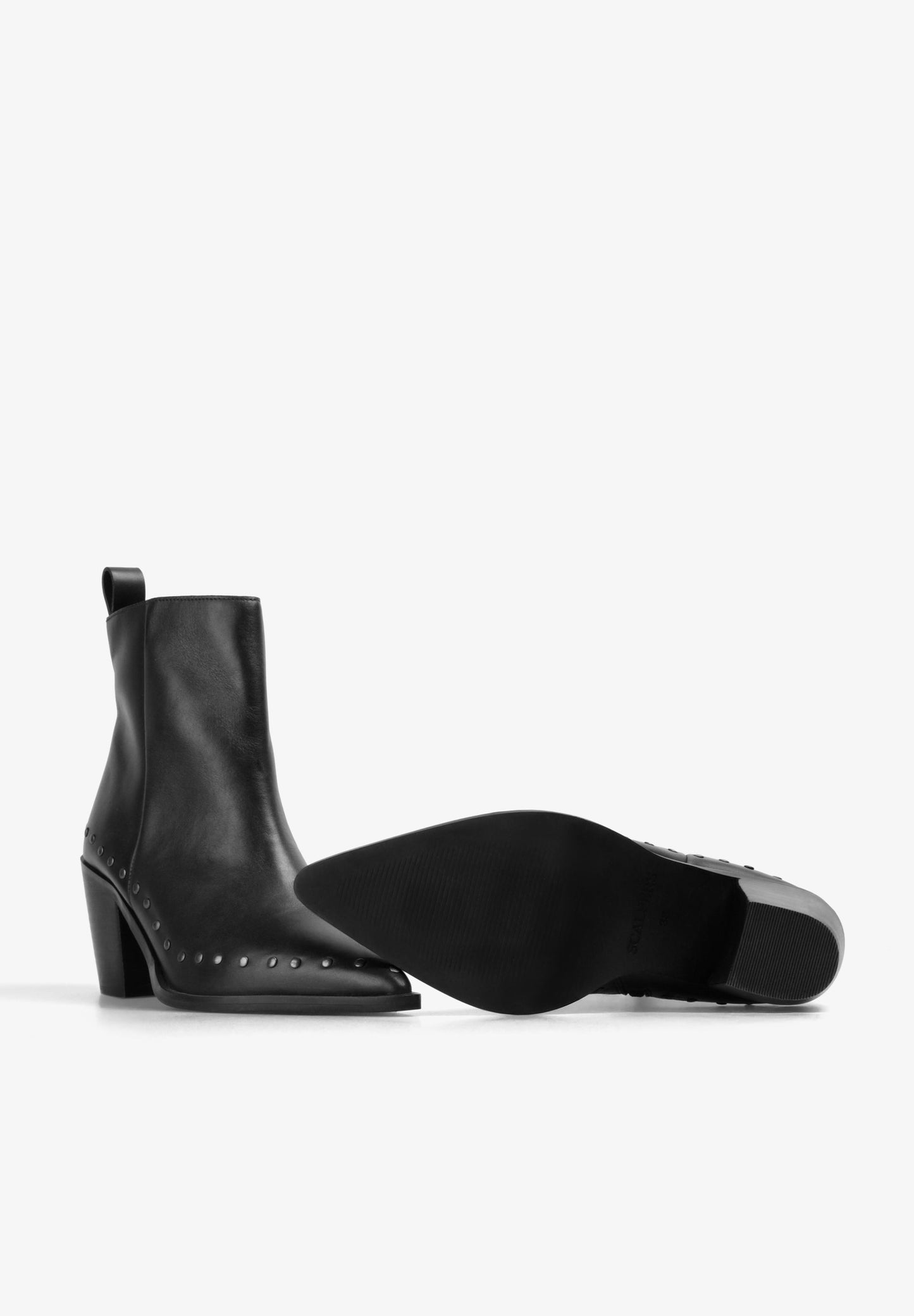 BOTAS DE PIEL CON TACHAS