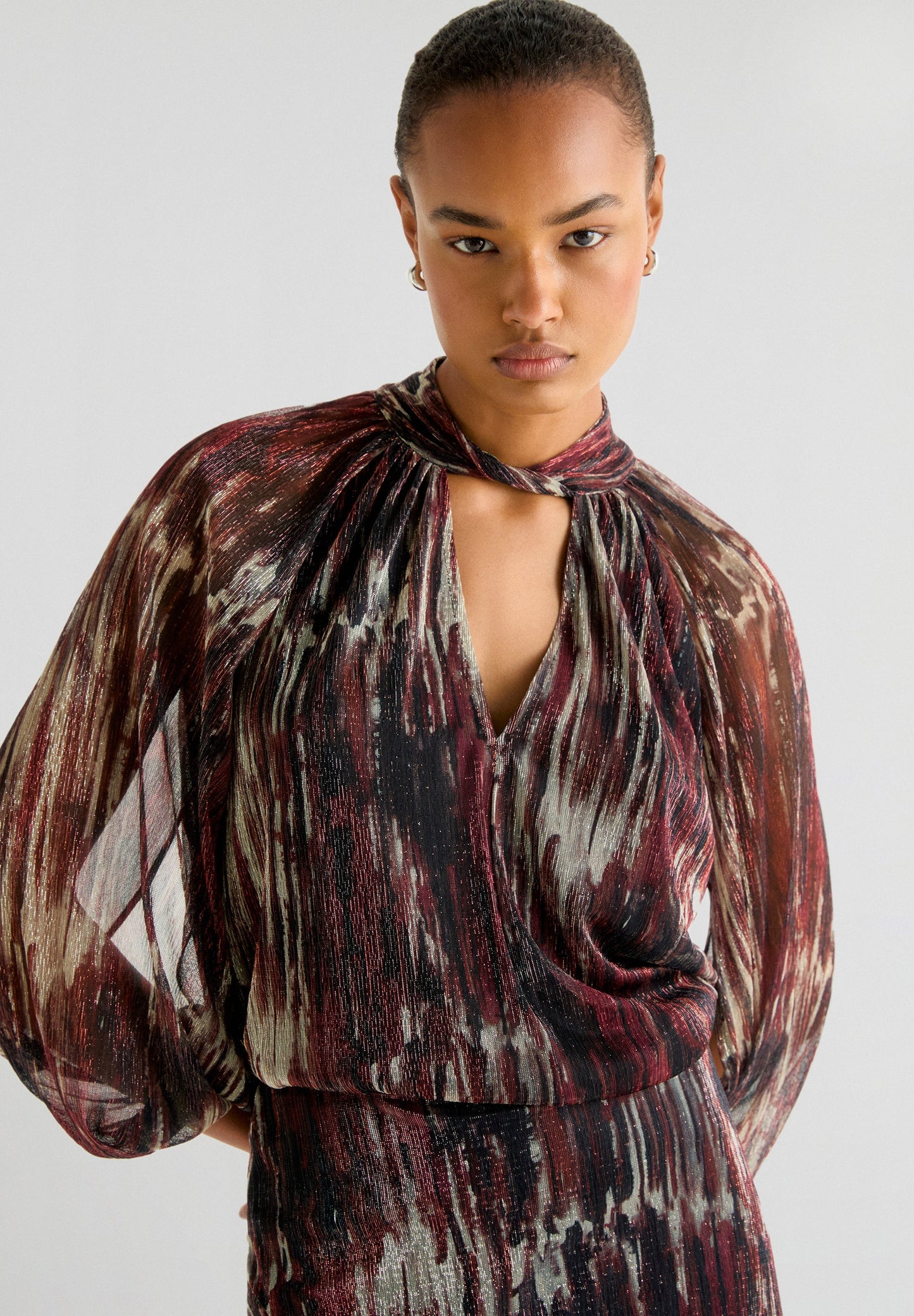 BLUSA LUREX DETALLE ESCOTE