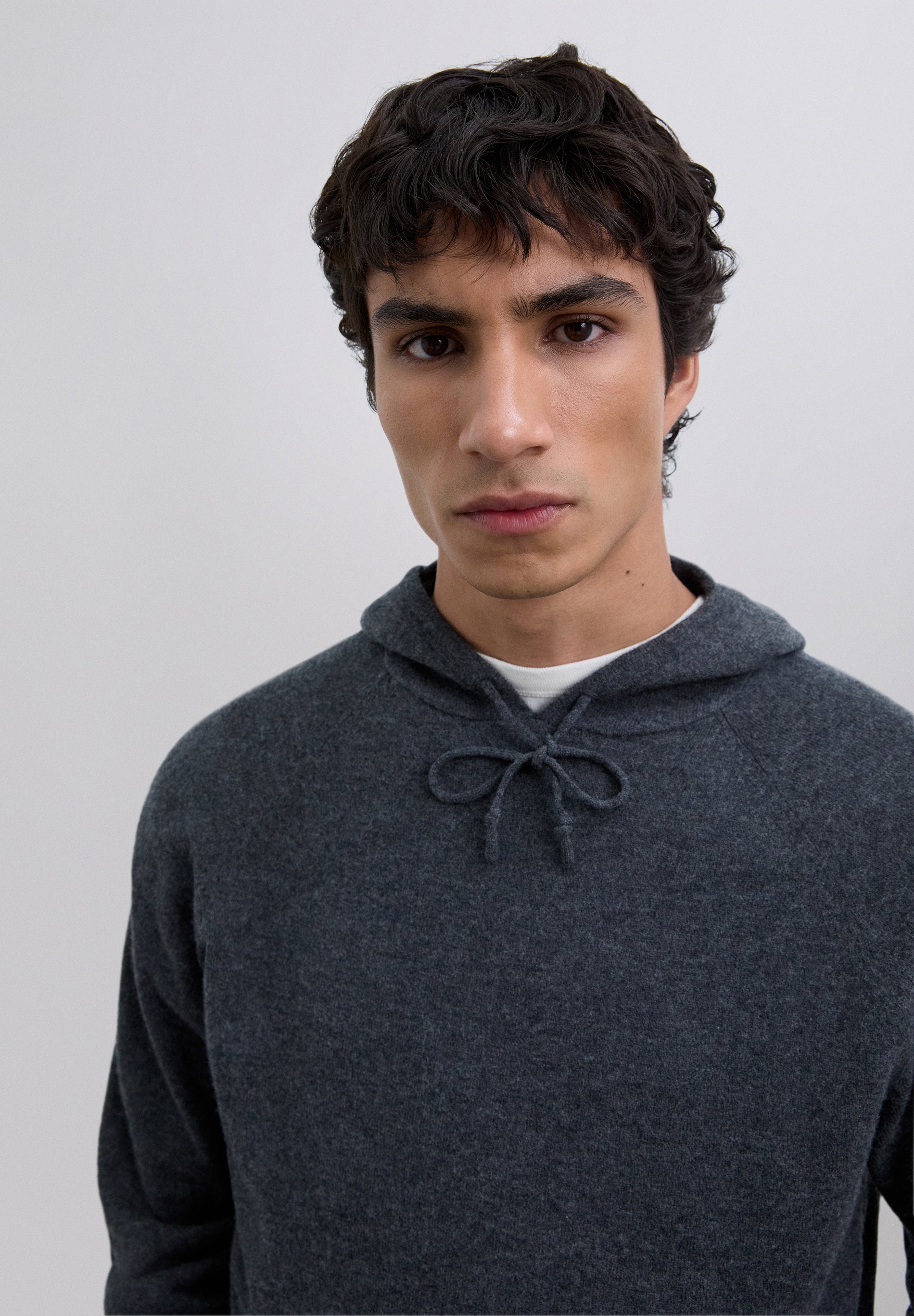 CHALECO PUNTO LANA CAPUCHA