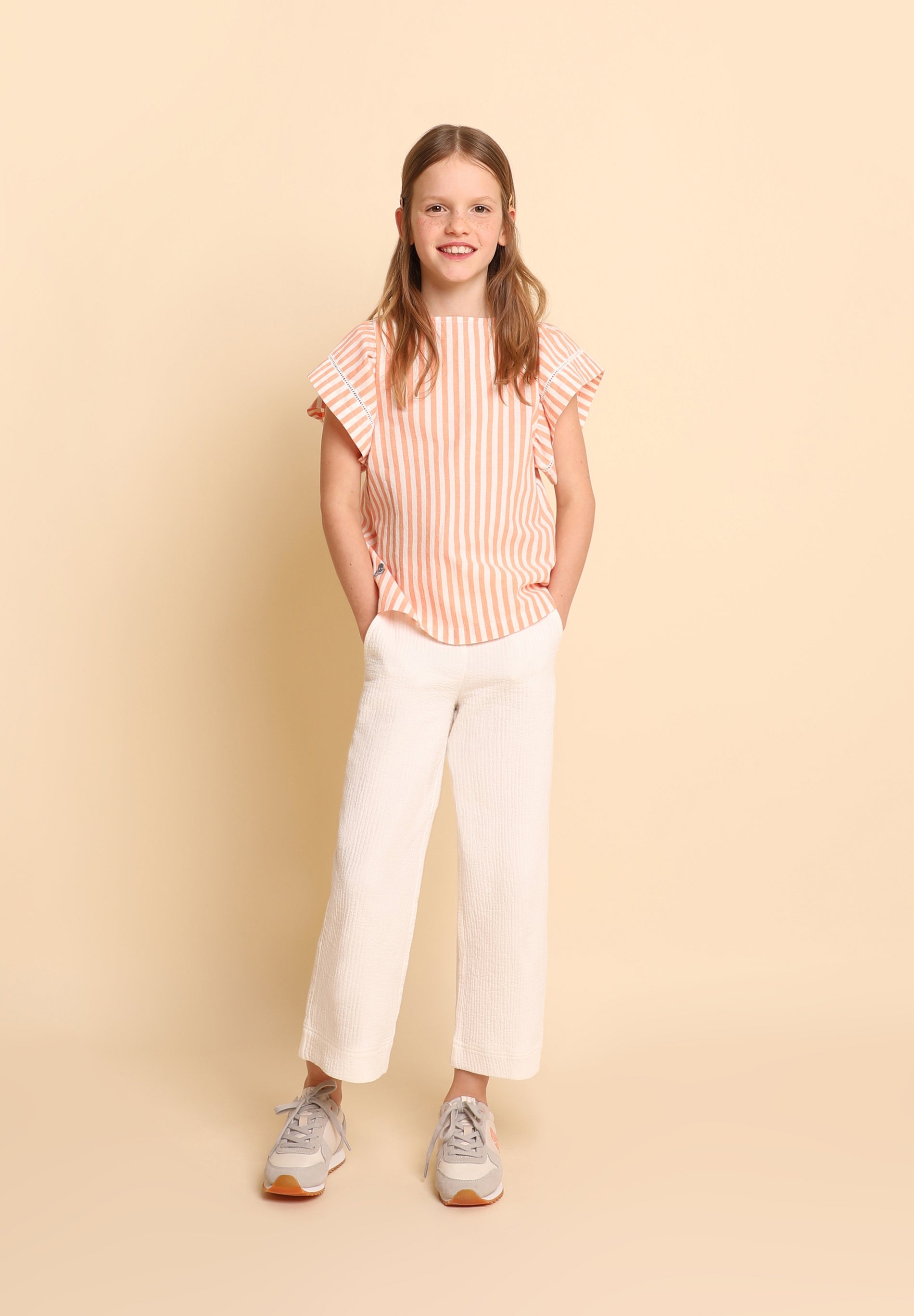 BLUSA RAYAS VOLANTES
