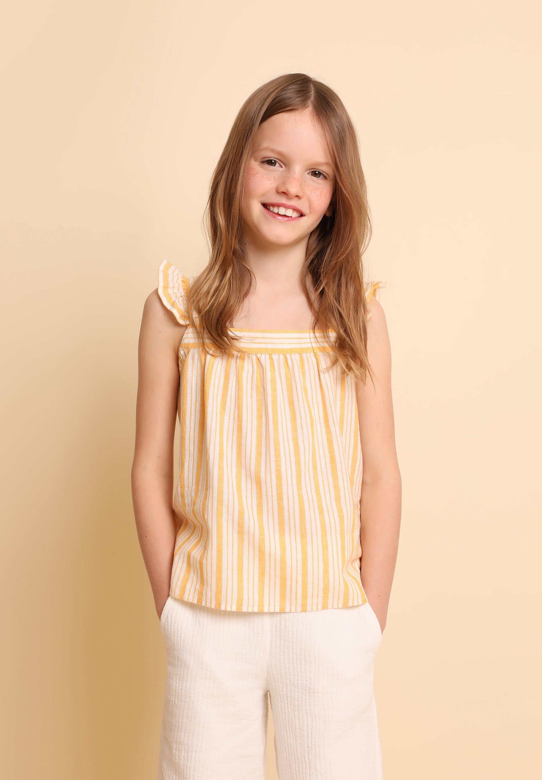 BLUSA RAYAS LAZO TRASERO