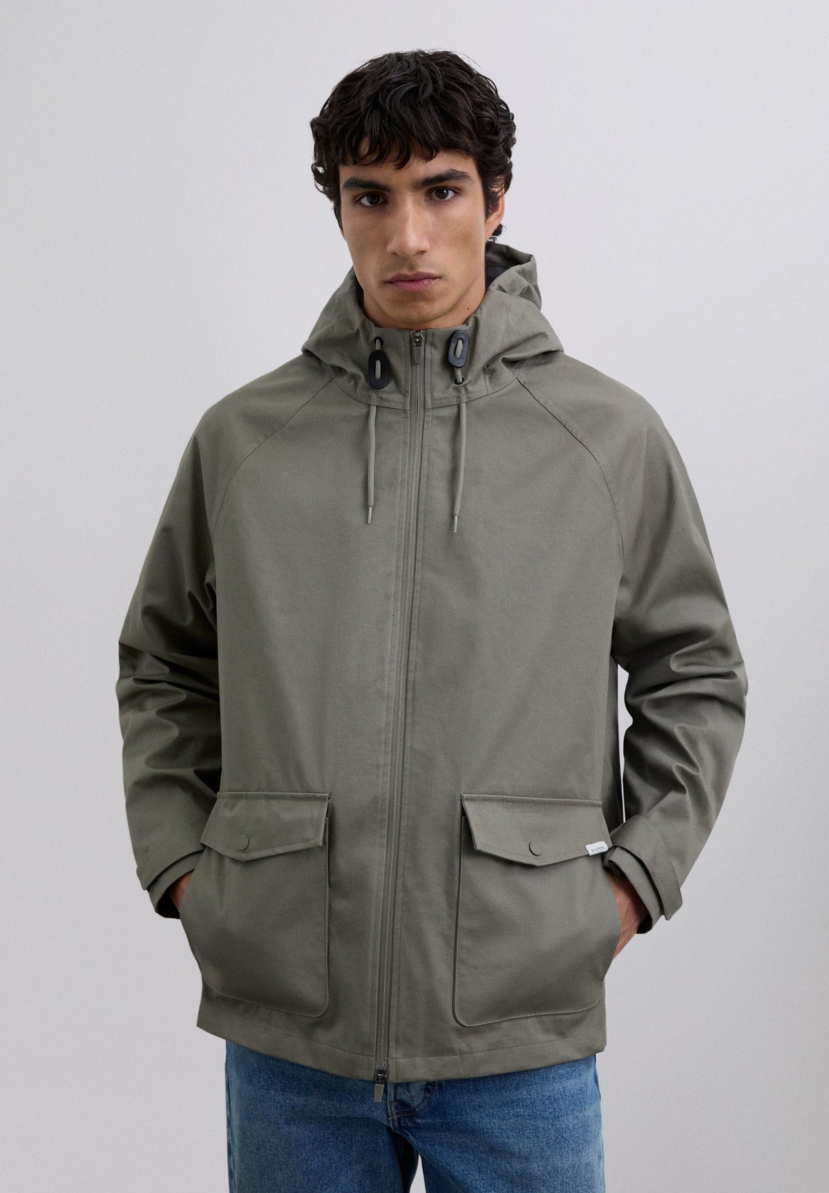 CHAQUETA IMPERMEABLE LOGO