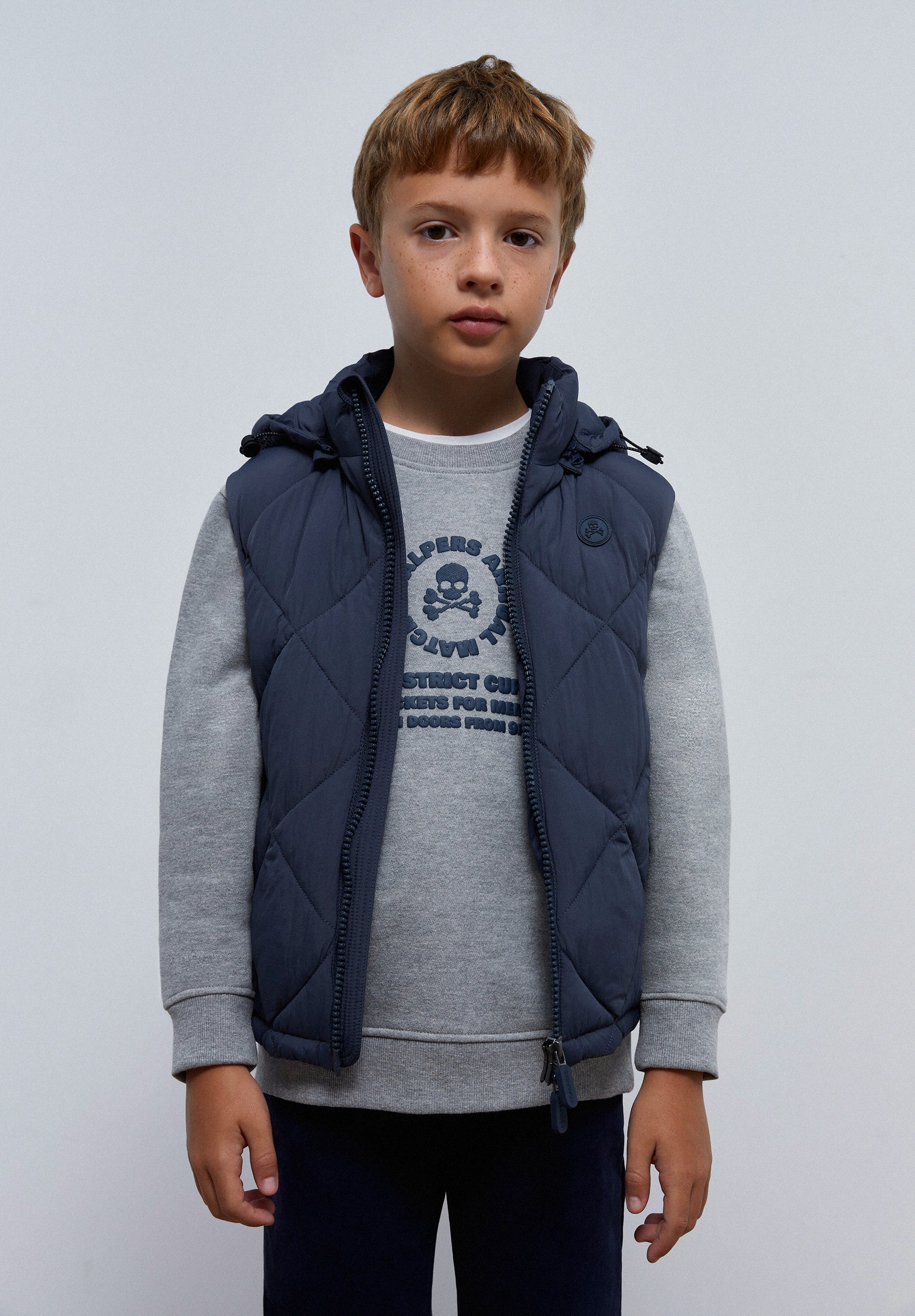 CHALECO ACOLCHADO CAPUCHA