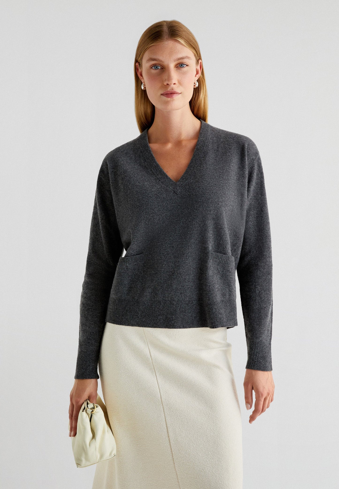 SWEATER BOLSILLOS CUELLO EN V