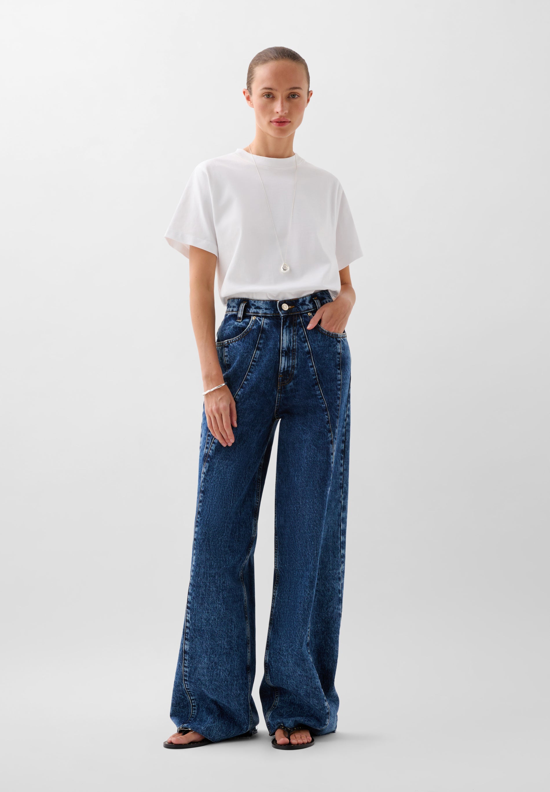 JEANS COSTURA TIRO ALTO