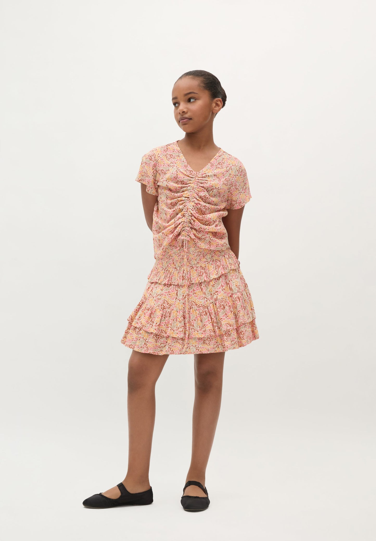 FALDA MINI FLORES VOLANTES