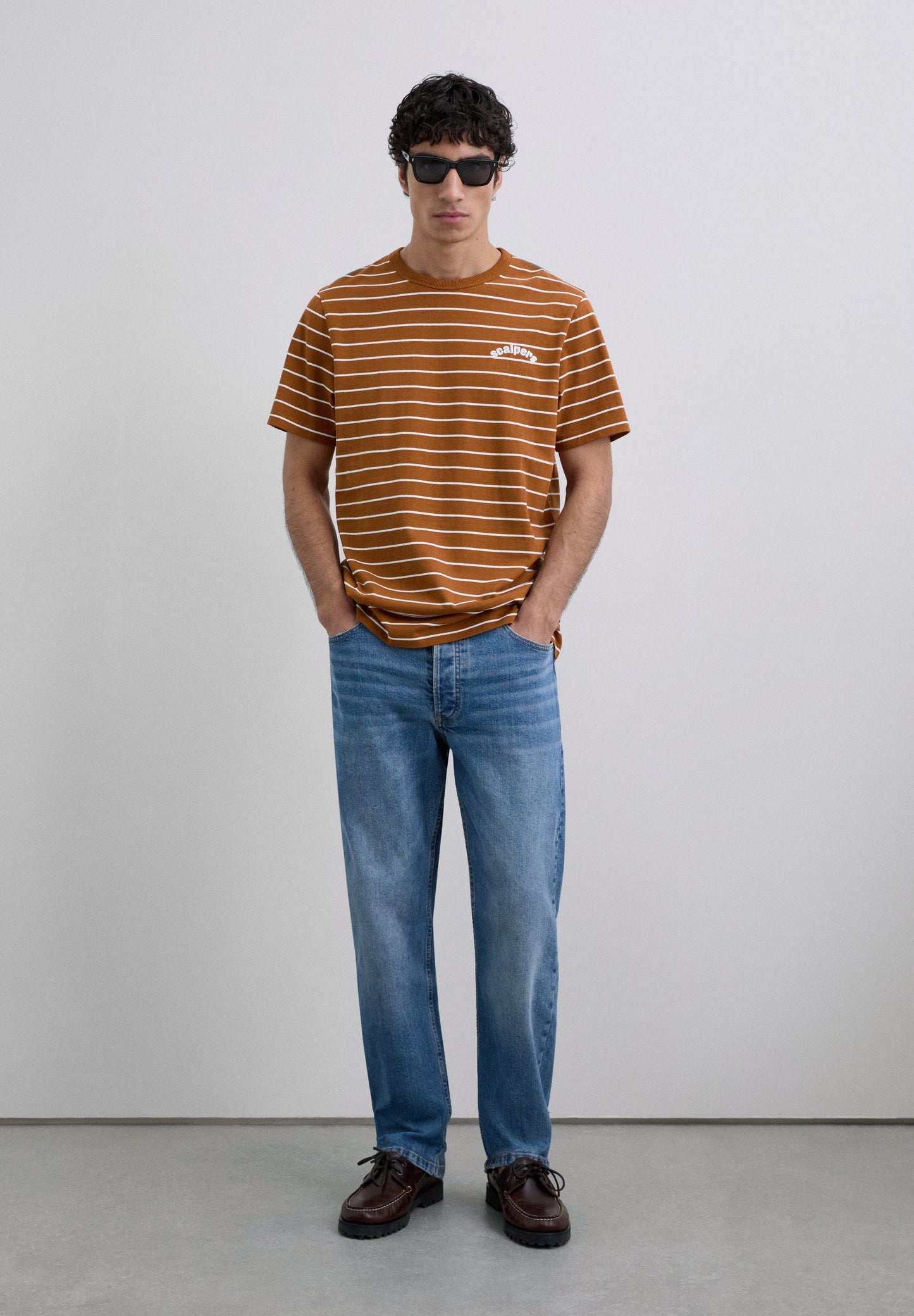 POLERA ESTAMPADA RAYAS LOGO