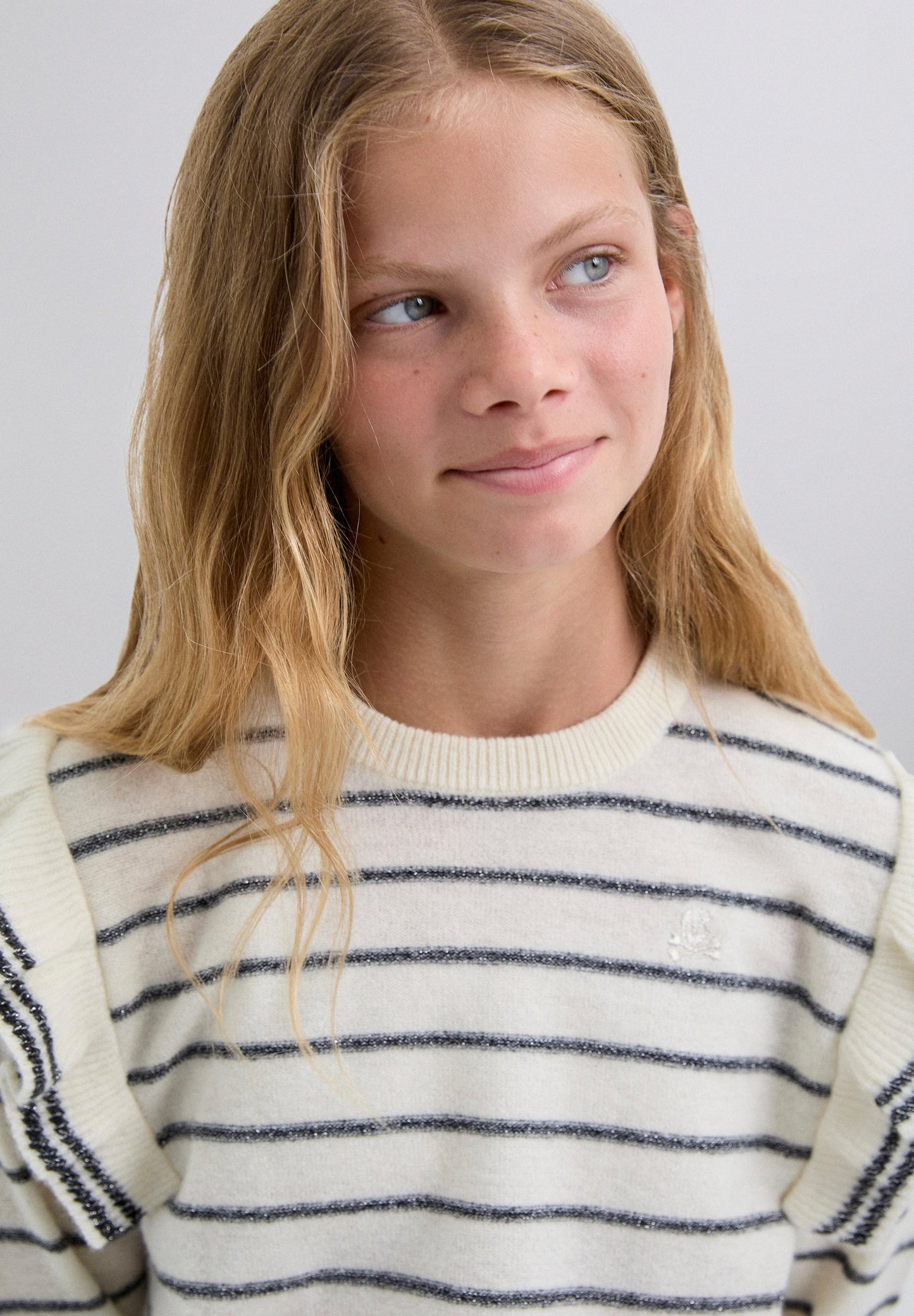 SWEATER RAYAS VOLANTE