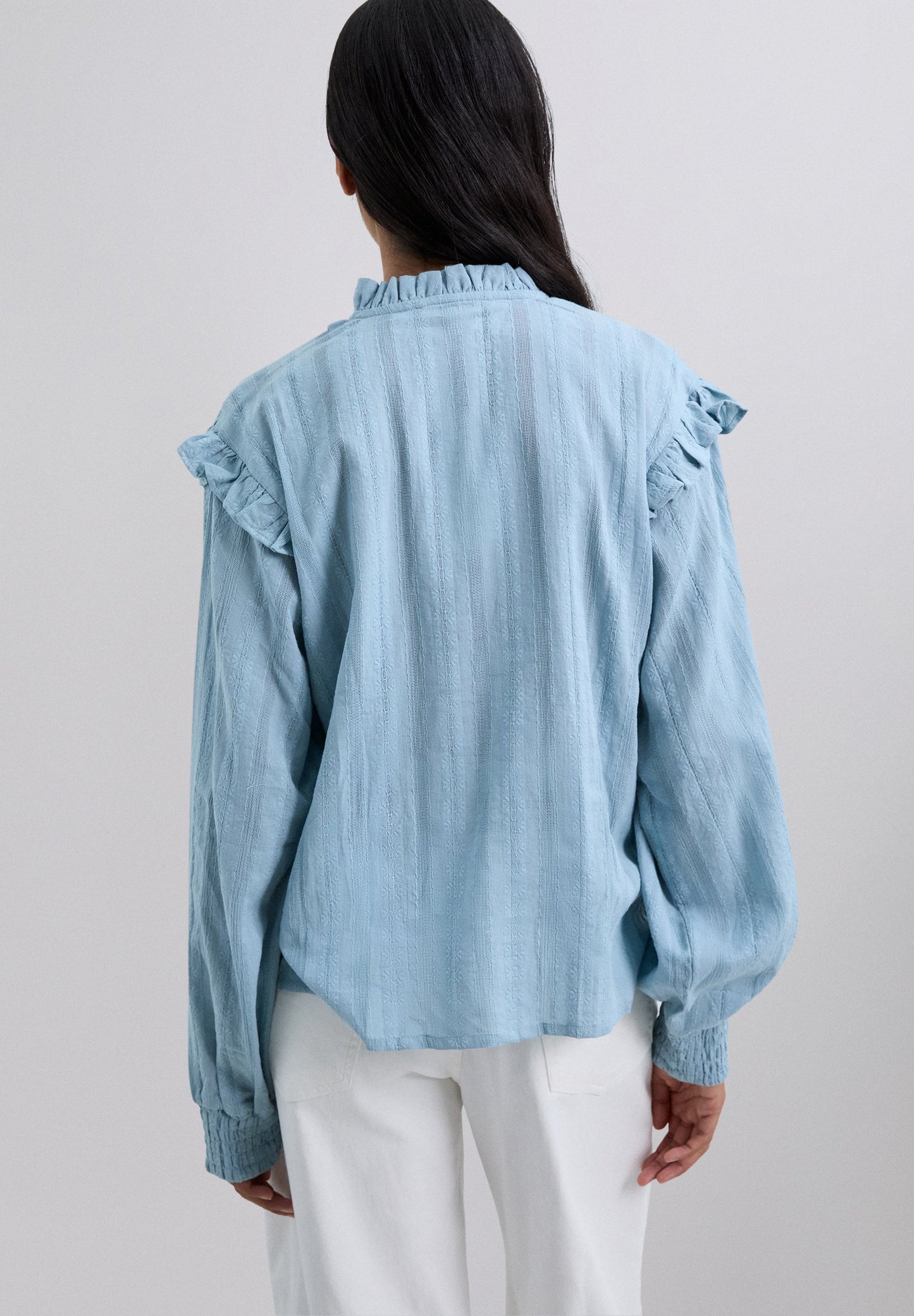 BLUSA FRUNCIDA CON VOLANTE