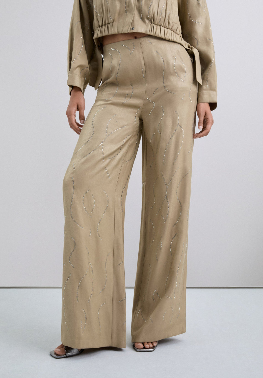 PANTALÓN FLUIDO CON PIEDRAS STRASS - Scalpers