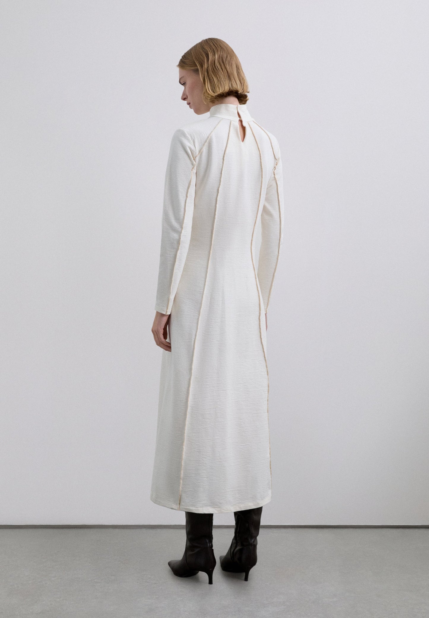 VESTIDO MIDI PUNTO OVERLOCK