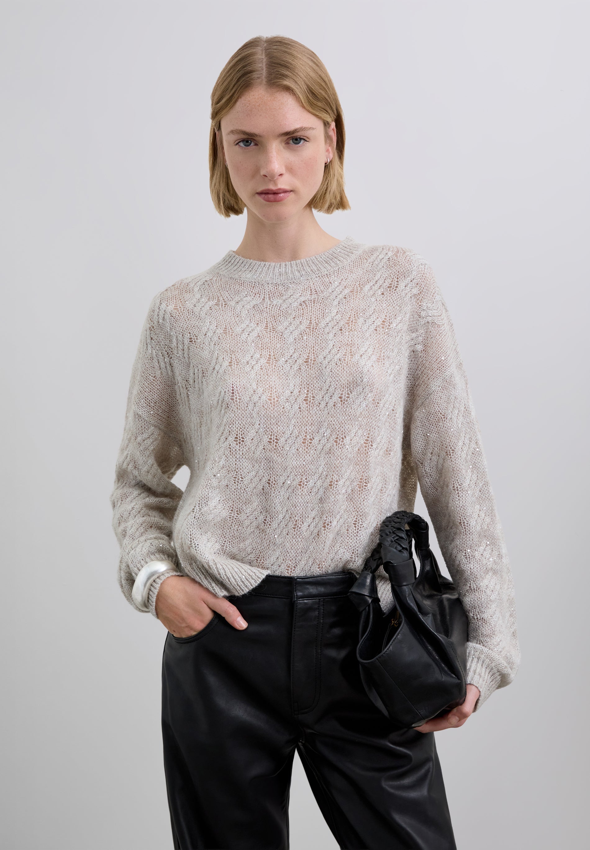 CHALECO DE PUNTO TRENZADO