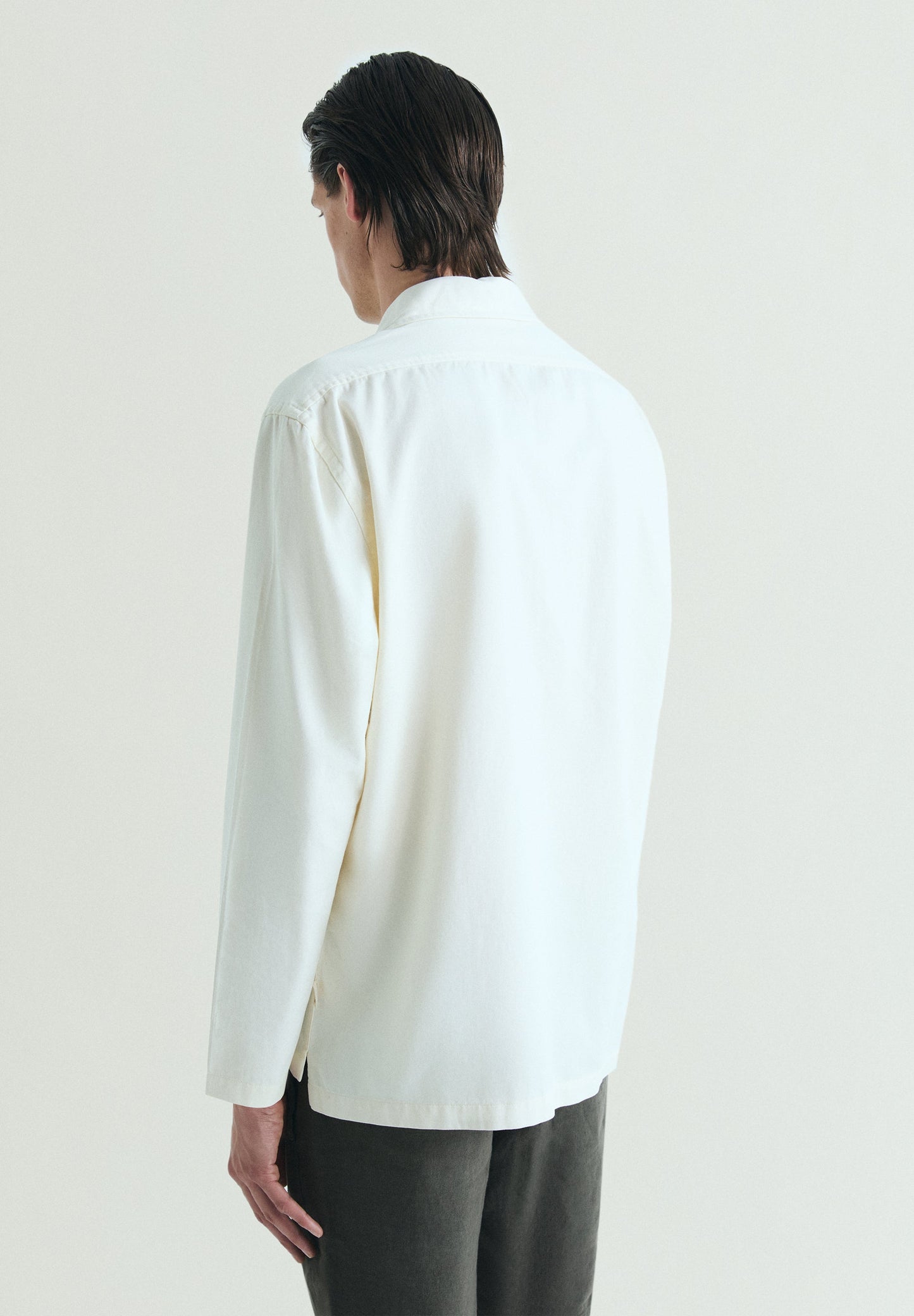 POLERA BOLSILLO CON BOTÓN