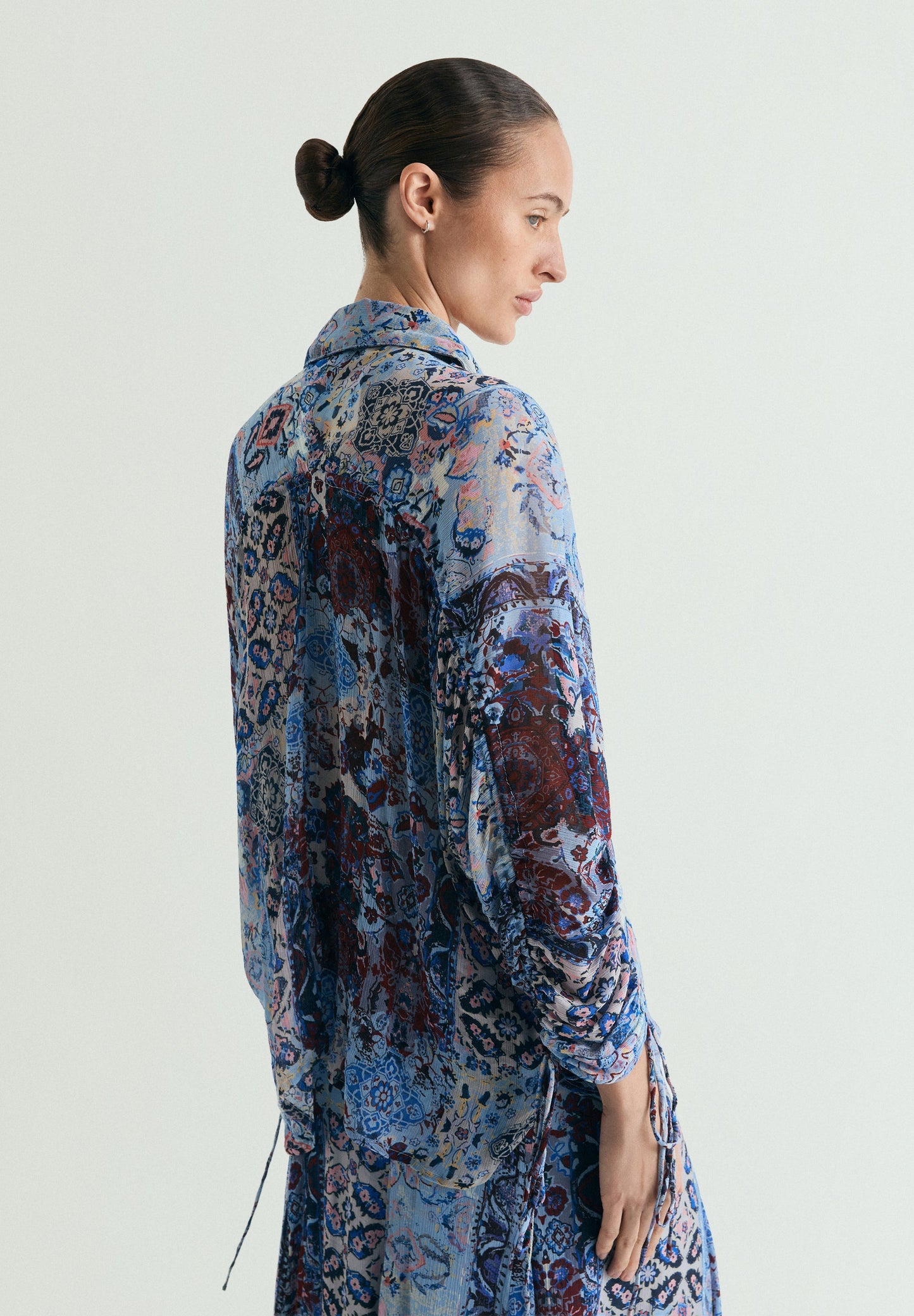BLUSA FLUIDA ESTAMPADA