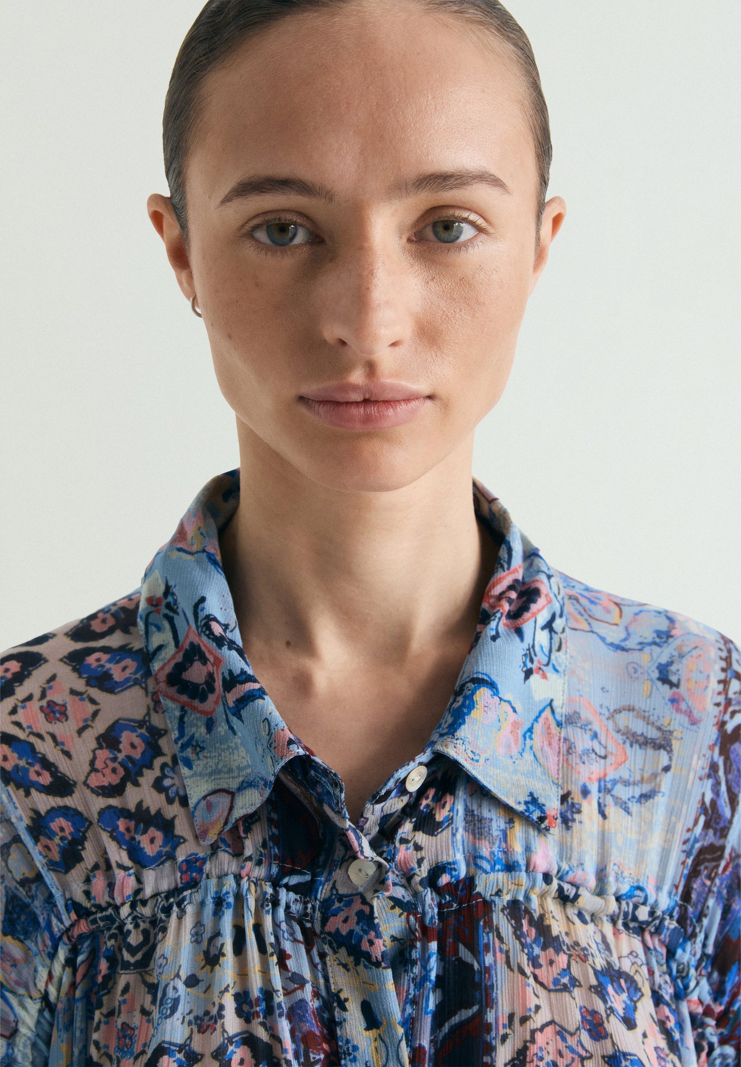 BLUSA FLUIDA ESTAMPADA