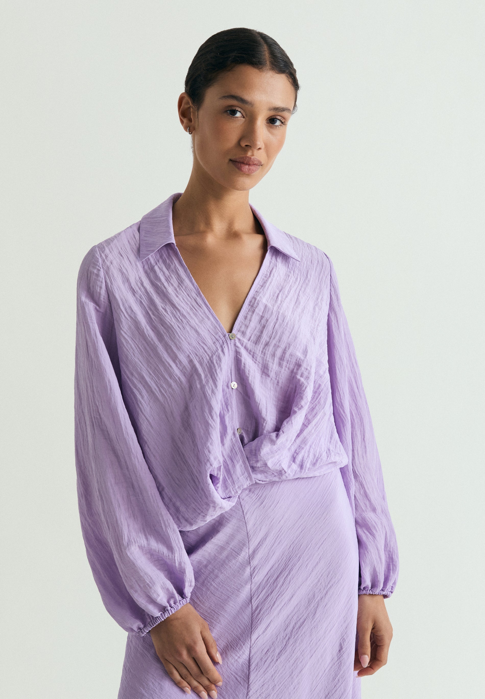 BLUSA FLUIDA DETALLE CRUZADO