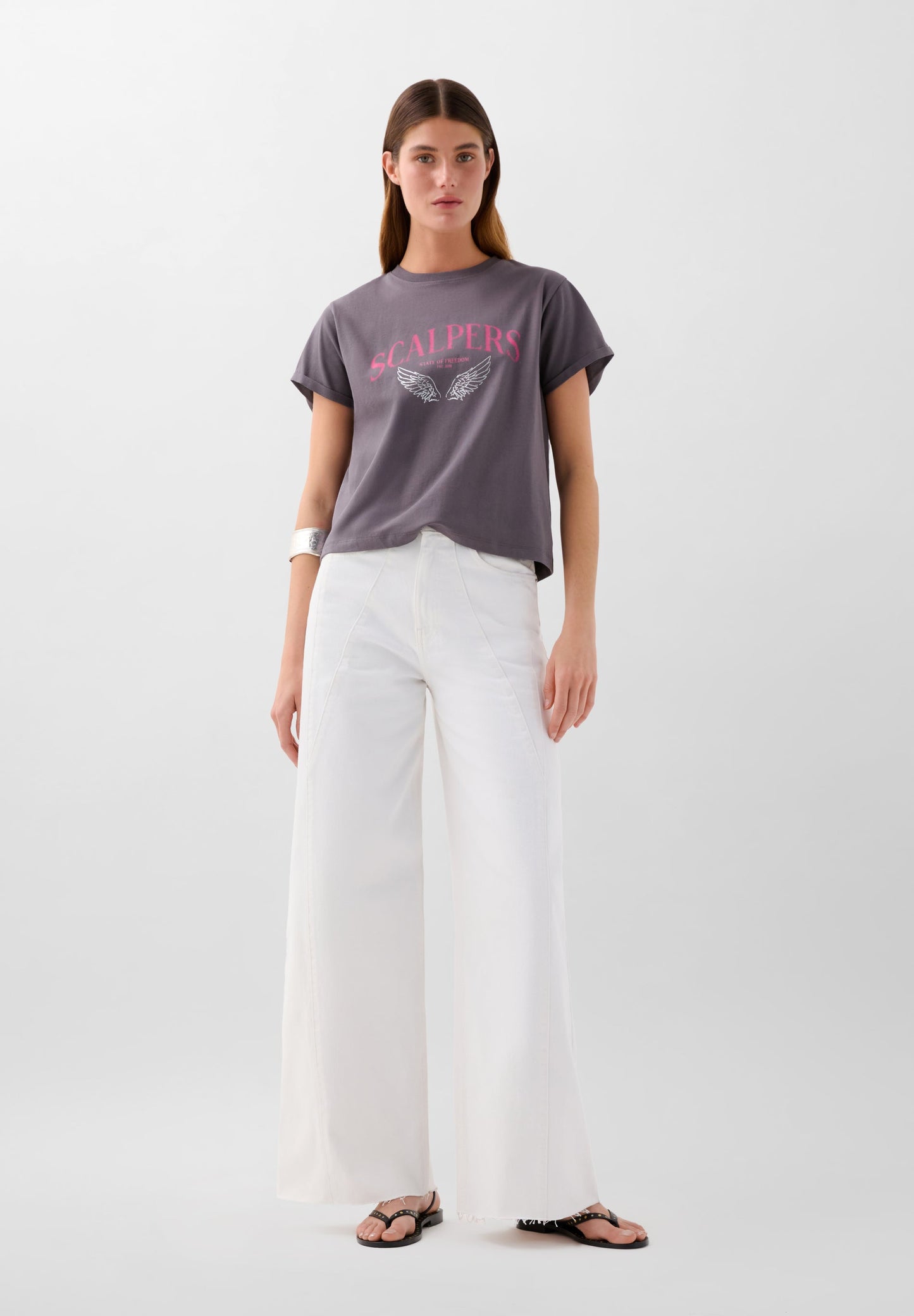 POLERA PRINT WINGS LOGO