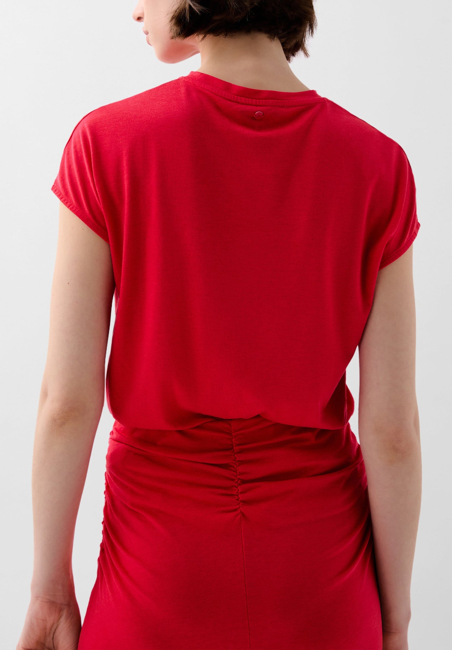 POLERA FRUNCES LATERALES