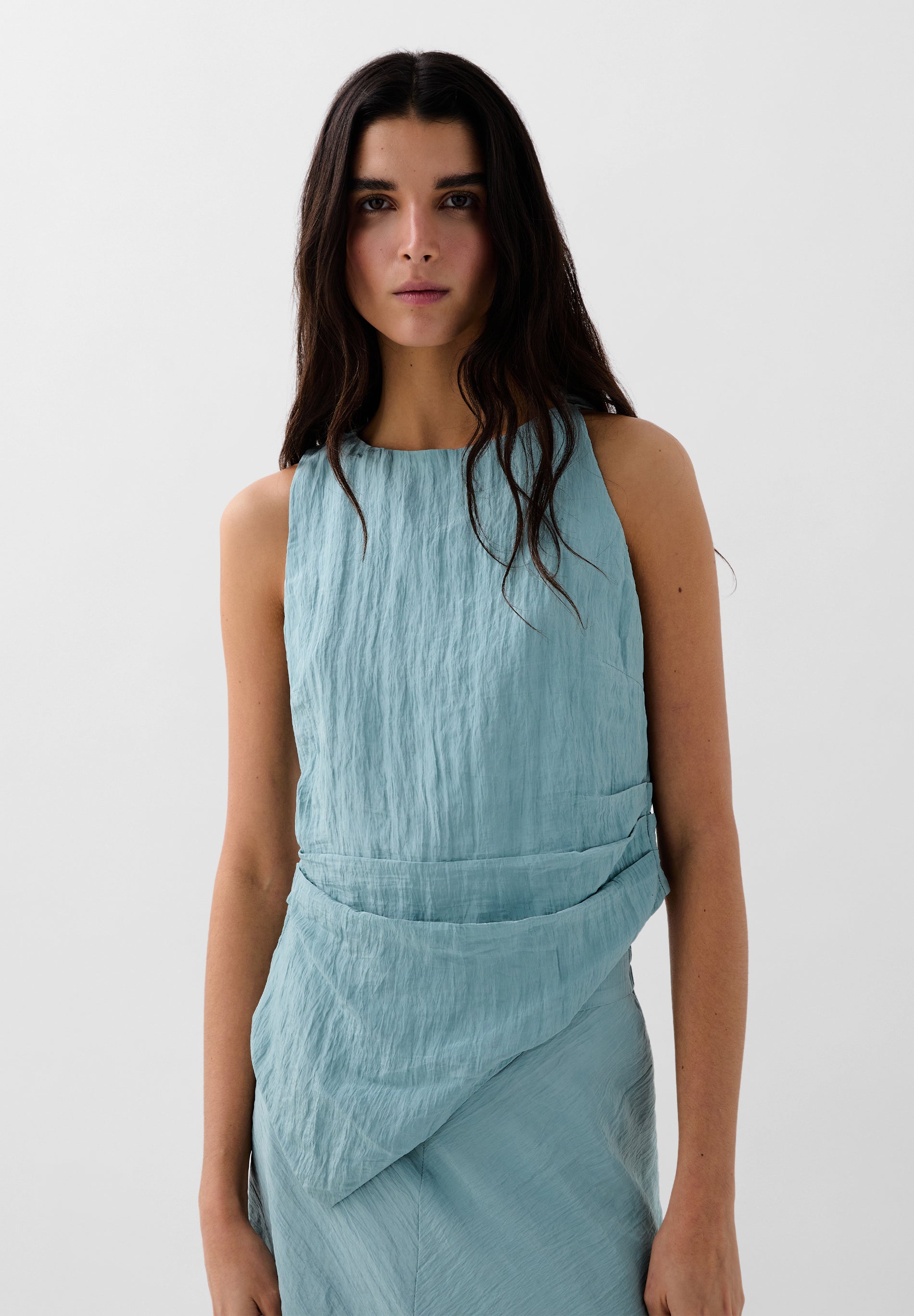 TOP PLISADO ASIMÉTRICO