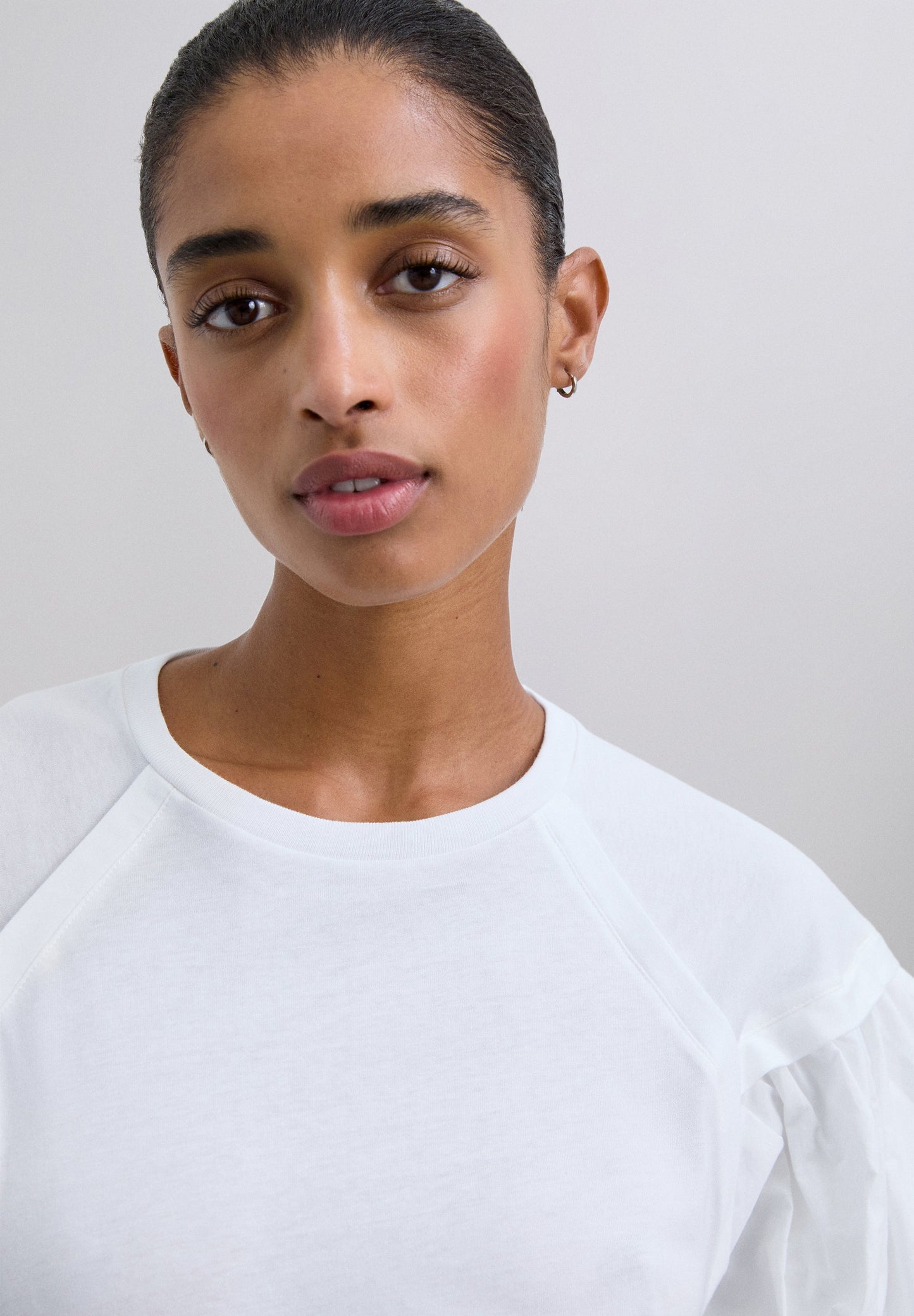 POLERA MANGA ABULLONADA