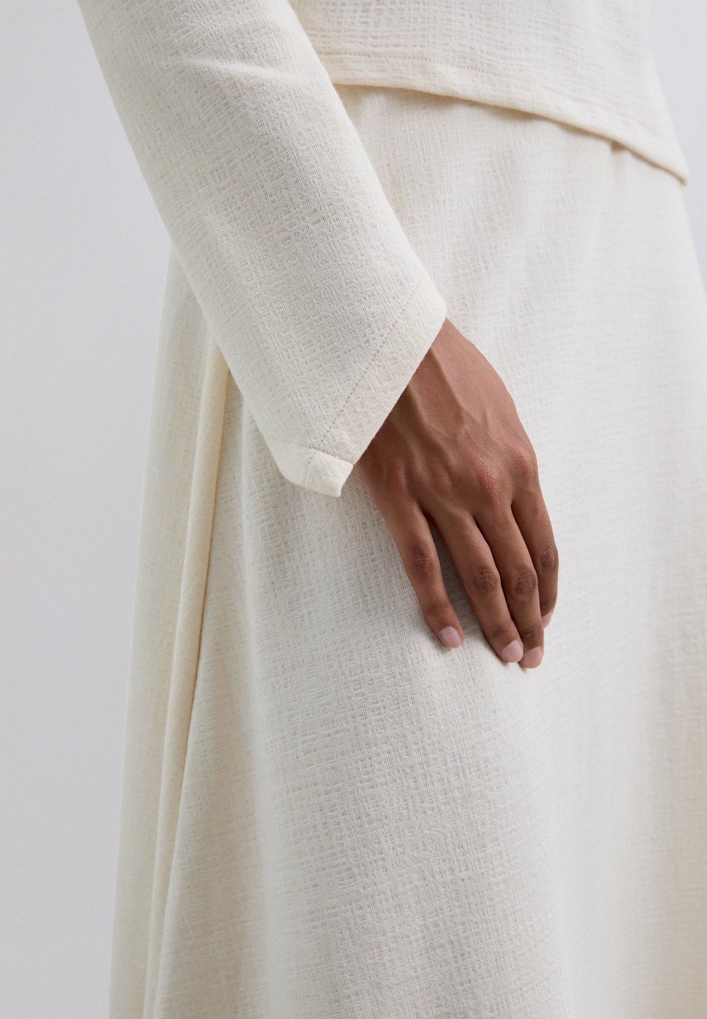 FALDA MIDI PUNTO ASIMÉTRICA