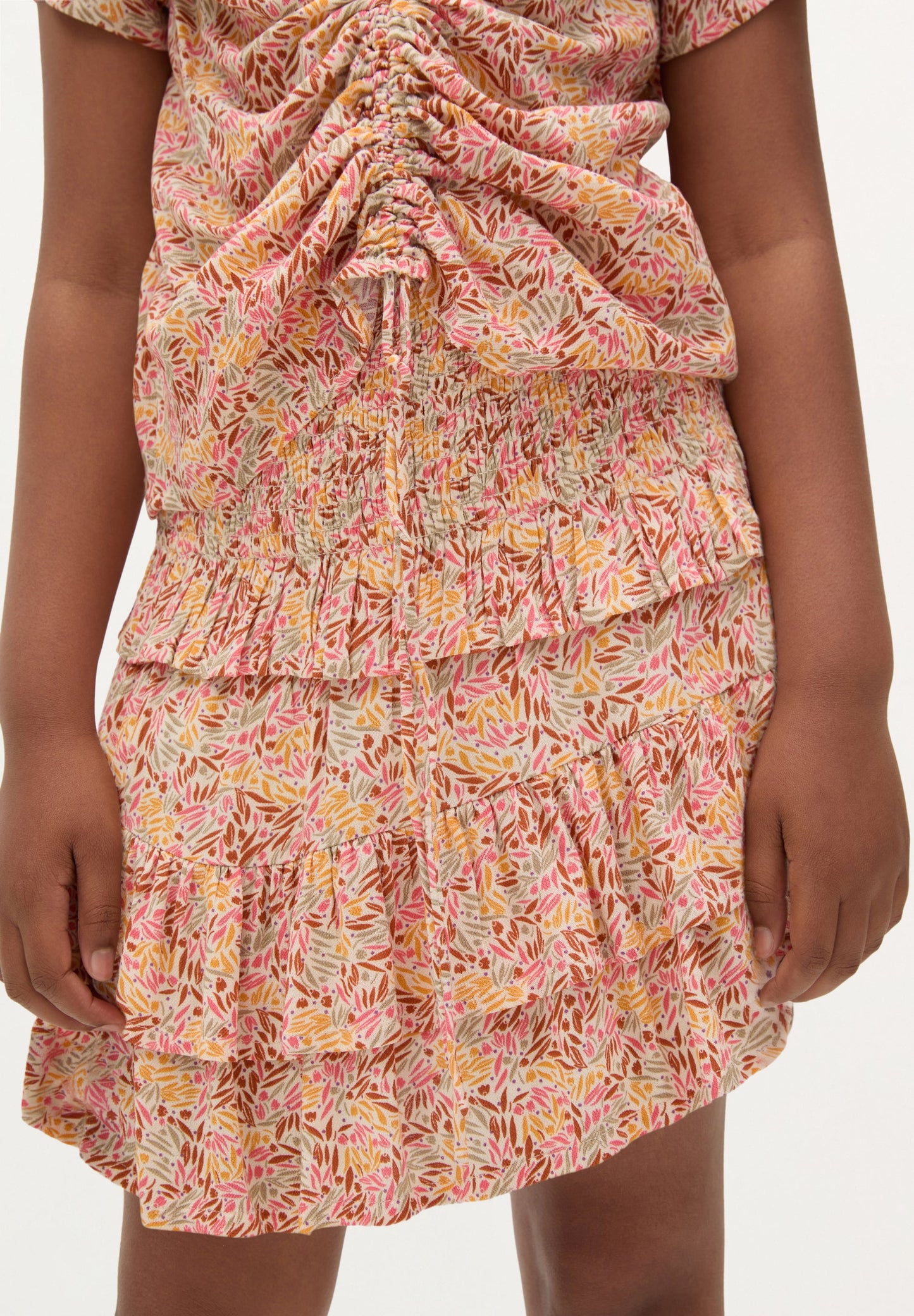 FALDA MINI FLORES VOLANTES