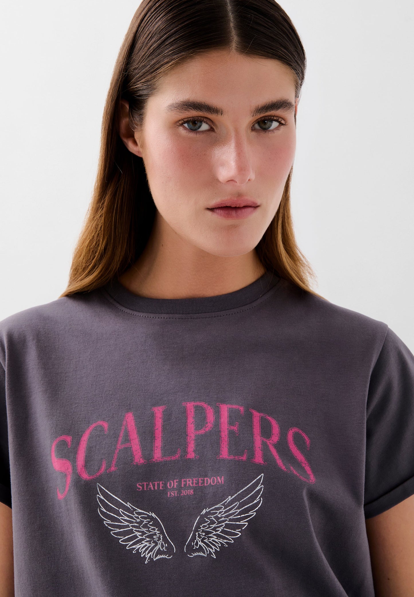 POLERA PRINT WINGS LOGO