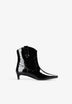 BOTAS PIEL PUNTA TACHAS