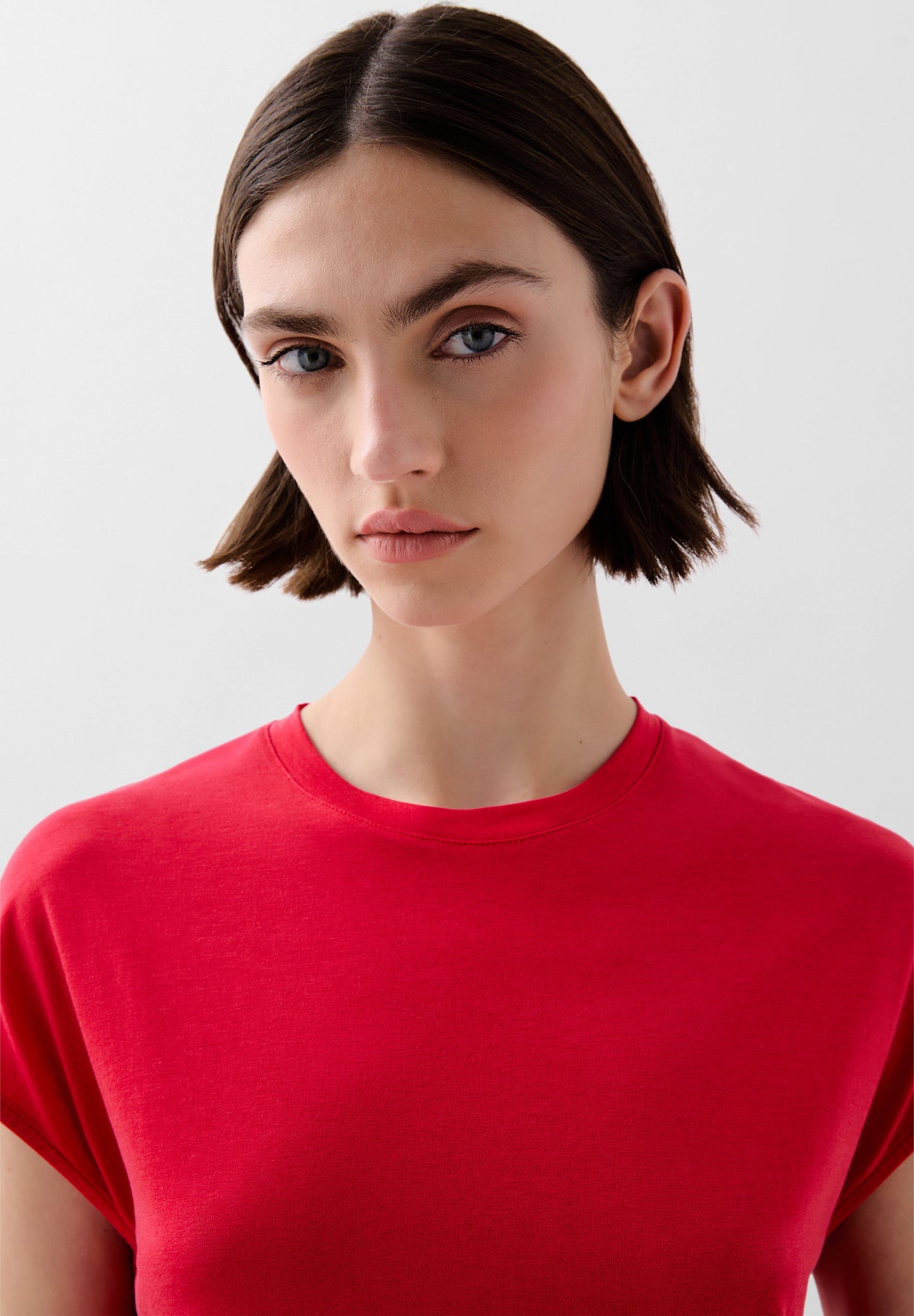 POLERA FRUNCES LATERALES