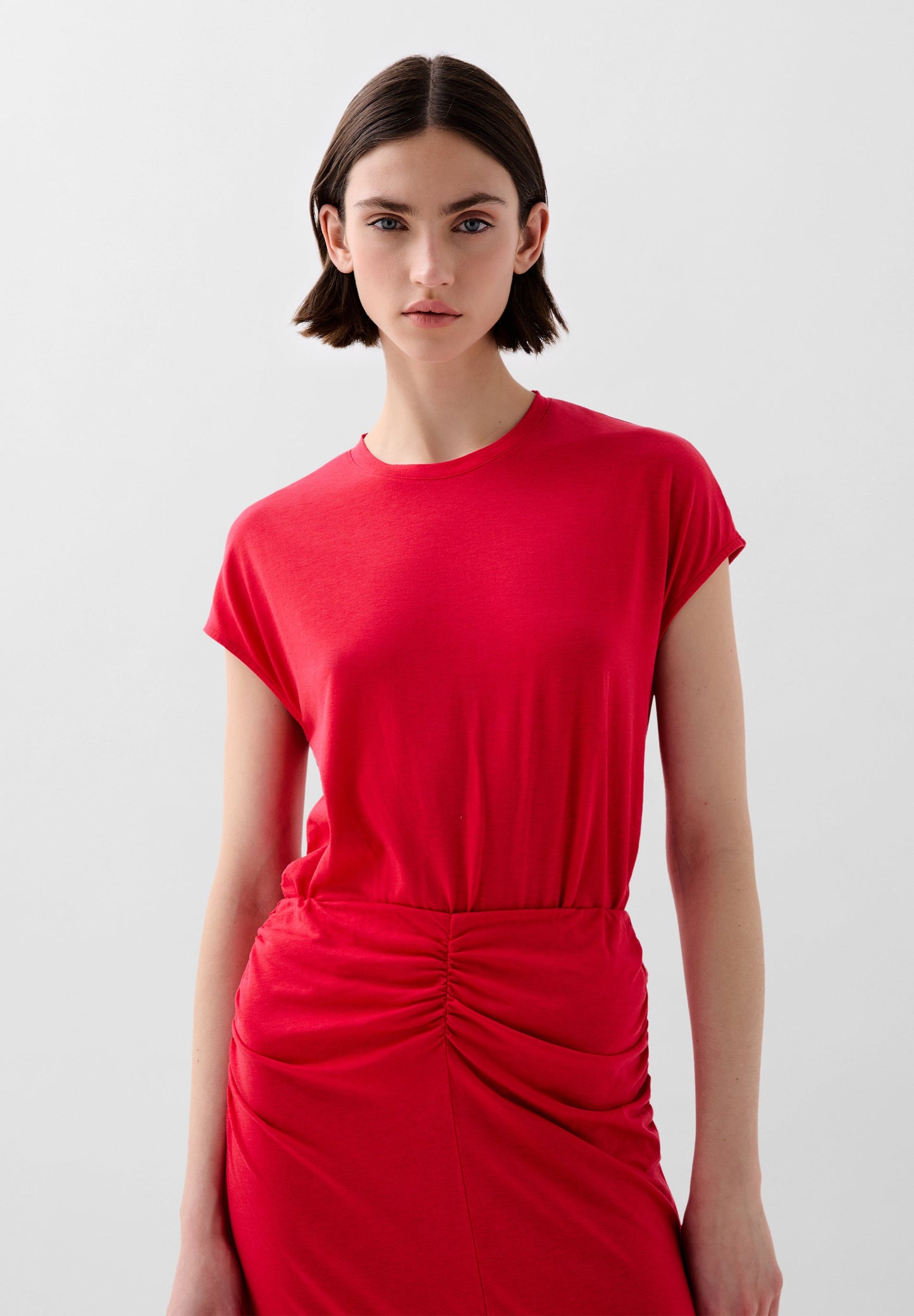 POLERA FRUNCES LATERALES