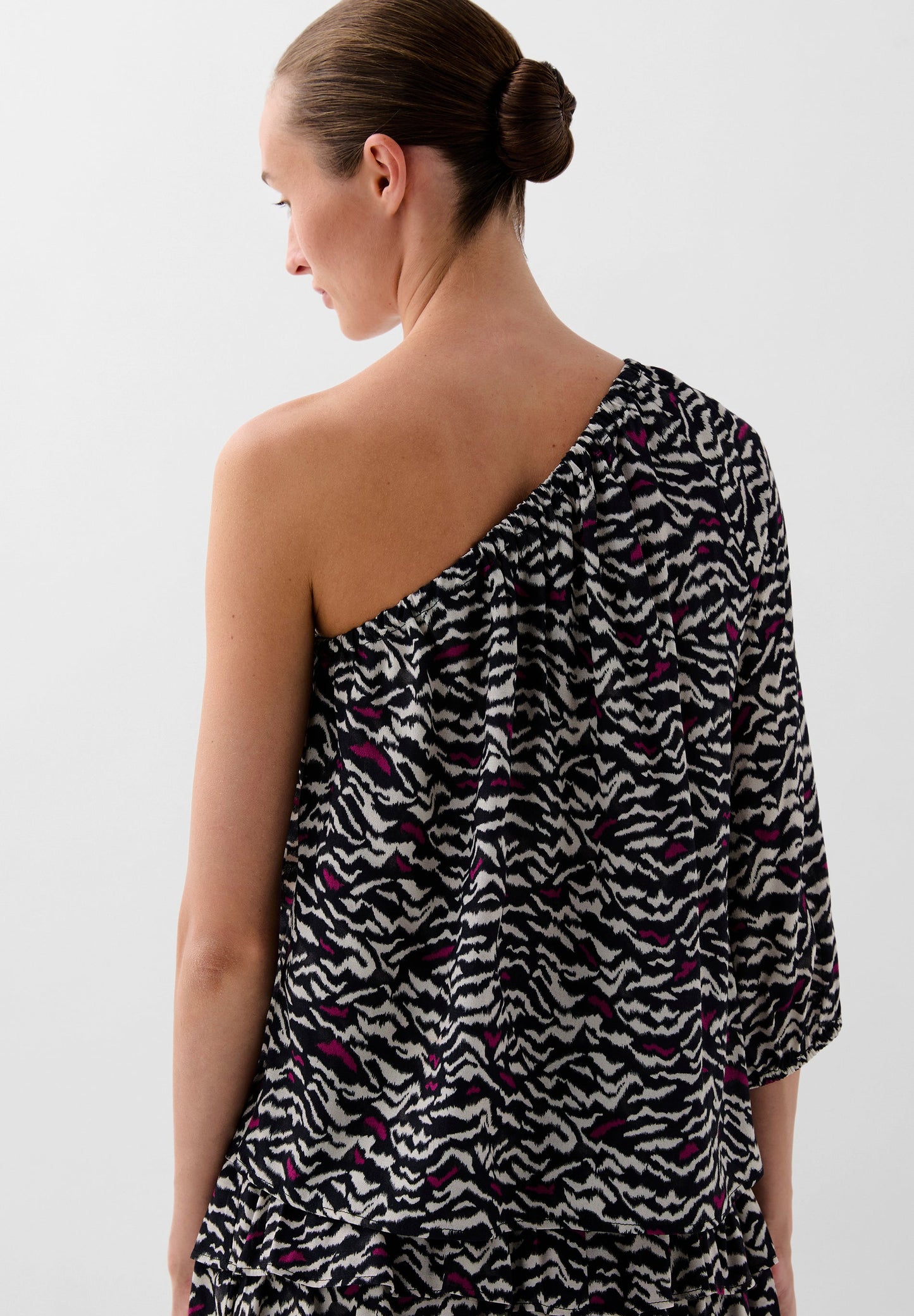 BLUSA ASIMÉTRICA ANIMAL PRINT