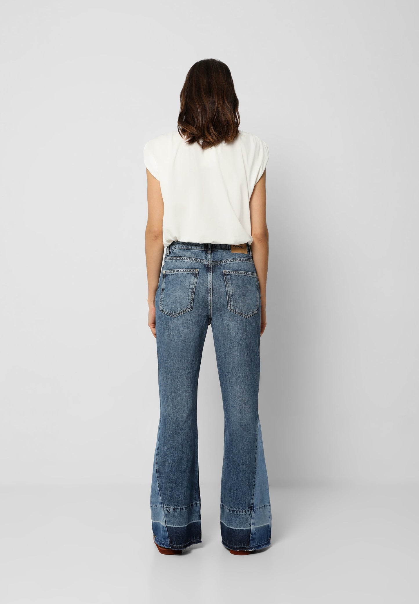 JEANS FLARE BAJO PATCH