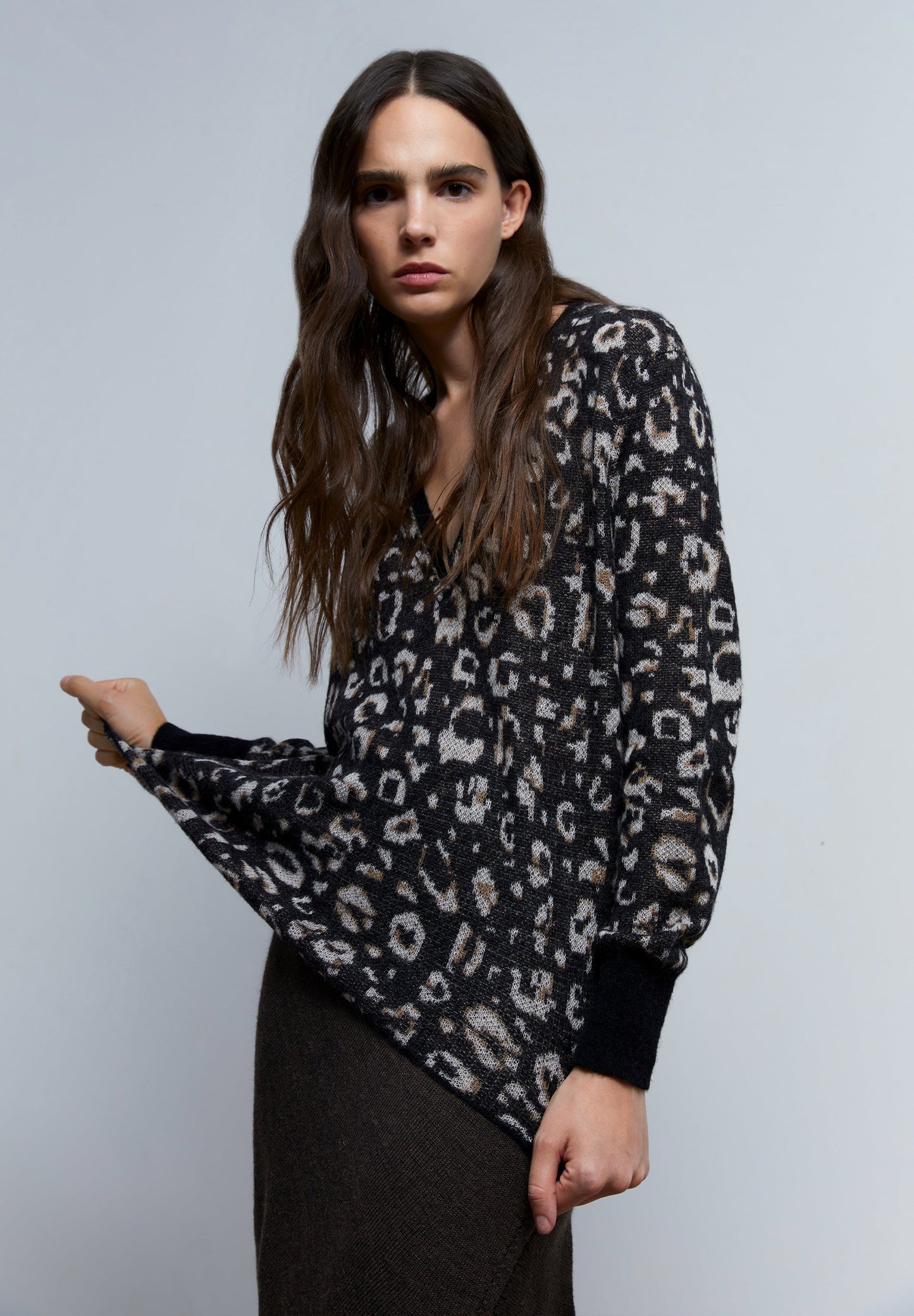 SWEATER PUNTO ANIMAL PRINT