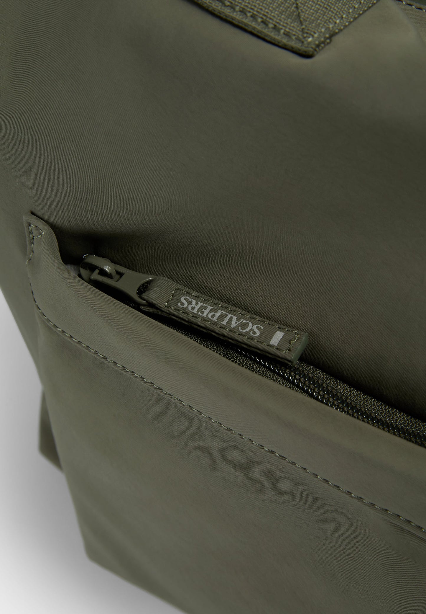 BOLSA TÉCNICA CON BOLSILLOS
